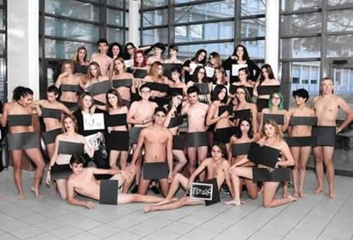 Only in France: Pupils (and their teacher) pose naked for school photo