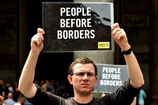 Amnesty slams Switzerland’s 'illegal' treatment of migrants at Italian border