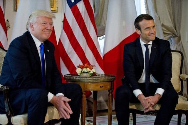 Trump meets Macron, says whole world talking about win