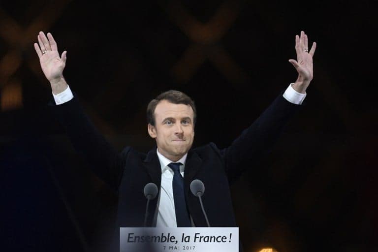 Macron vows to unite France after stunning election win
