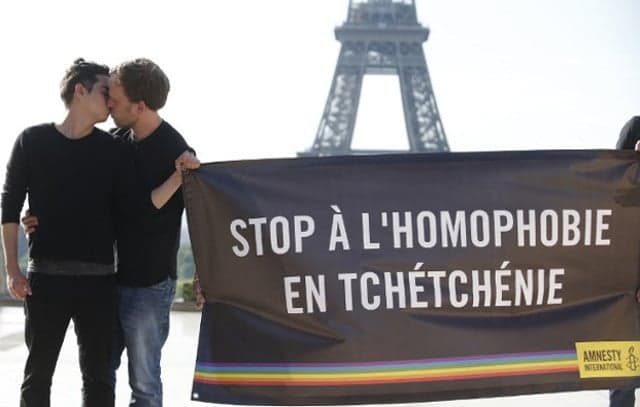 France announces arrival of first gay refugee from Chechnya just as Putin is in town
