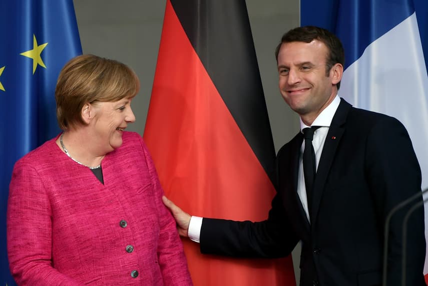 Merkel congratulates Macron on 'clear parliamentary majority'