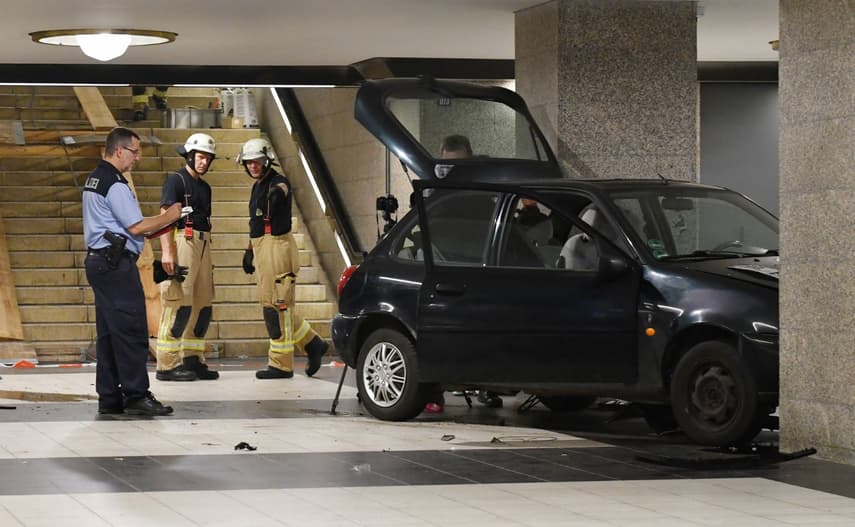 Three arrested after car drives down stairs of Berlin U-Bahn station