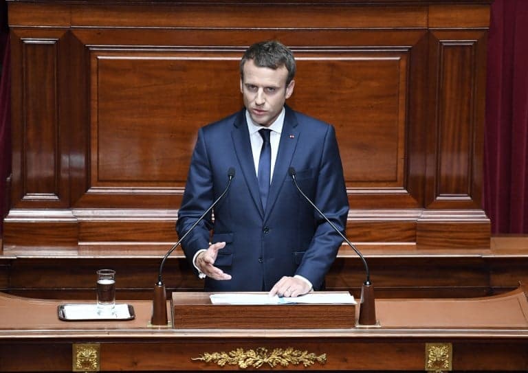 France is ready for 'radically new path', says Macron as he vows to slash French lawmakers by a third