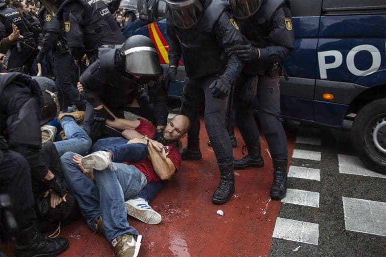 Spain government representative apologises for Catalan vote injuries