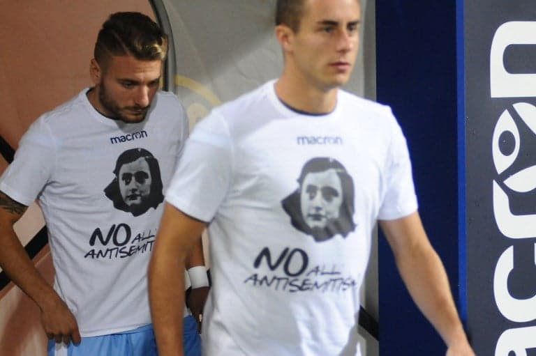 Lazio players don Anne Frank shirts, fans sing 'I don't care'