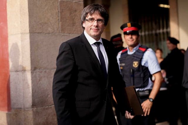 Catalan leader 'assumes mandate for independent state' but asks to suspend declaration