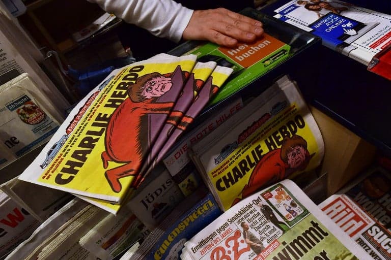 Charlie Hebdo gets fresh death threats over cartoon of Islamic scholar with erection