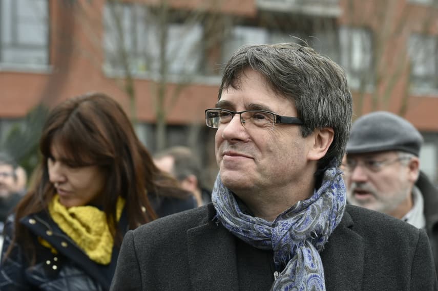 Ex-Catalan leader's party pledges to re-elect him remotely