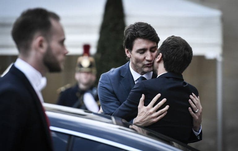 Macron and Canada's Trudeau deepen their 'bromance' in Paris
