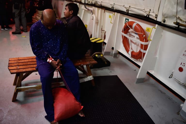 Rescued migrants allowed to land in Italy after two-day wait at sea