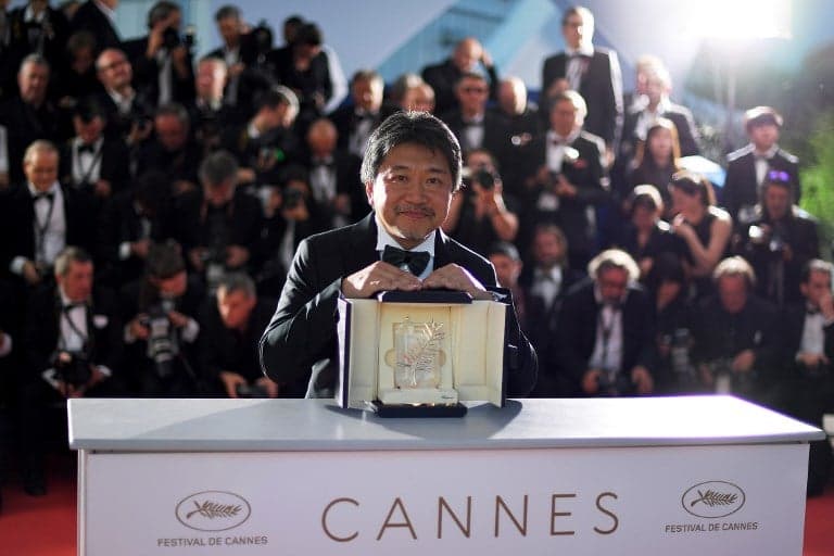 Japan wins Cannes top prize after Weinstein accuser takes stage