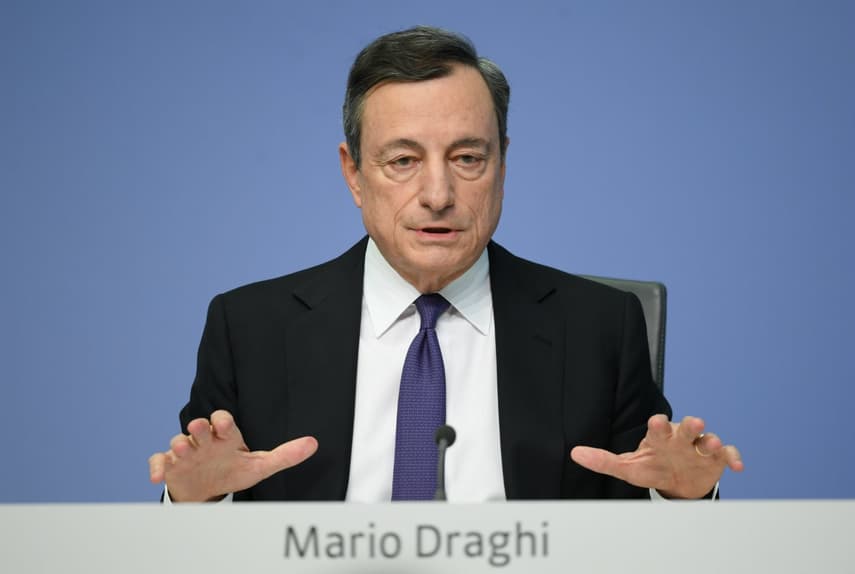 Draghi urges eurozone solidarity as Macron pushes reforms