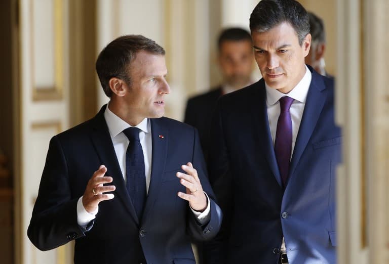 Macron backs sanctions on EU states that refuse migrants