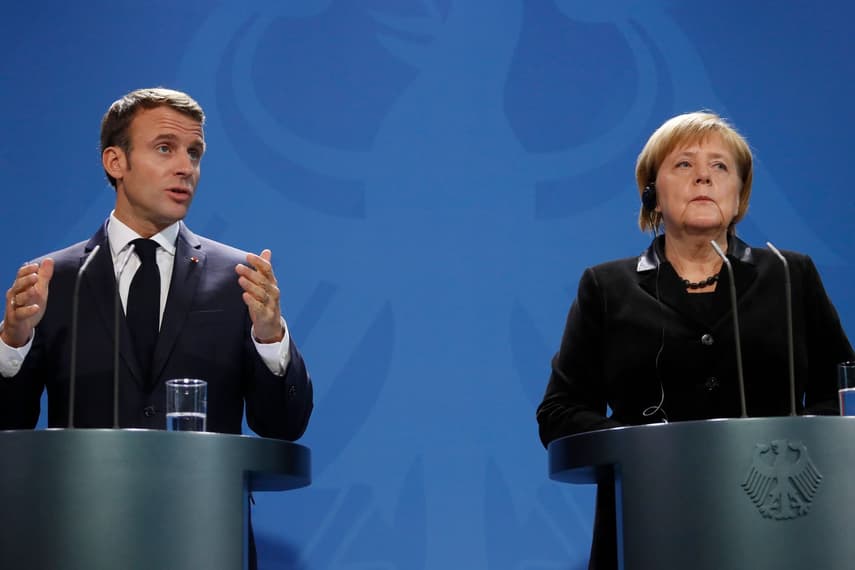 Macron, Merkel urge 'full' Ukraine ceasefire ahead of planned truce 