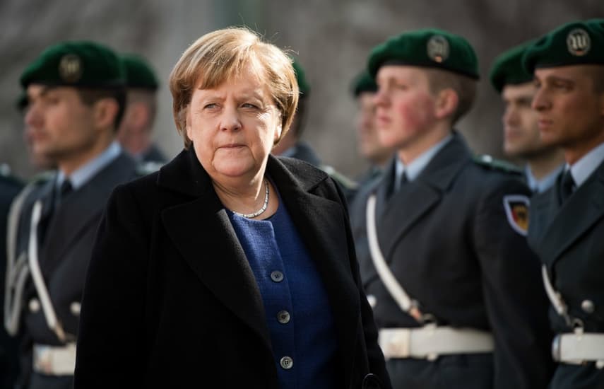 Merkel expresses 'regret' over May's Brexit defeat amid fears of no-deal