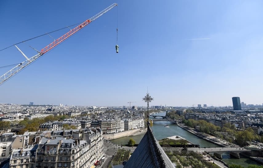 IN PICTURES: Watch Notre-Dame's 16 bronze statues being flown over Paris
