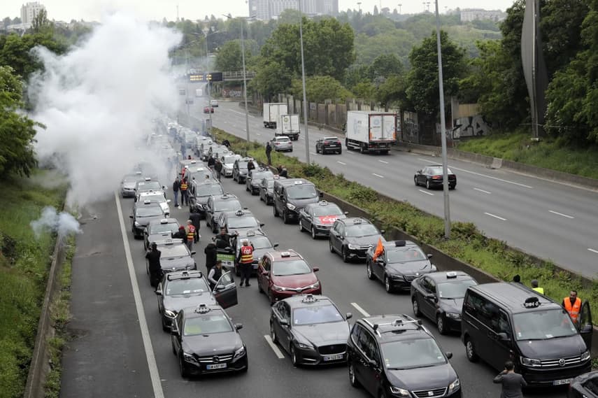 What is the protest by French taxi drivers, driving instructors and ambulance workers all about?