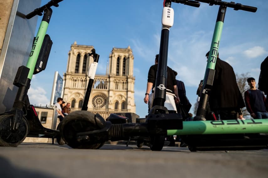 Paris threatens electric scooter firms with ban
