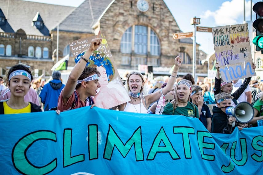 'We are unstoppable': Climate activists and pupils rally against German coal mine