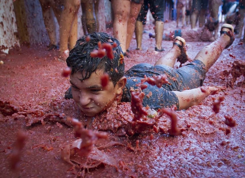 La Tomatina: Why does Spain have a huge tomato street fight?