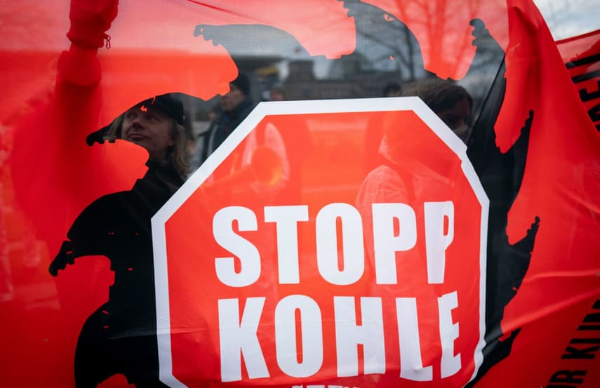 Activists stage protests in Germany as cabinet passes coal exit law