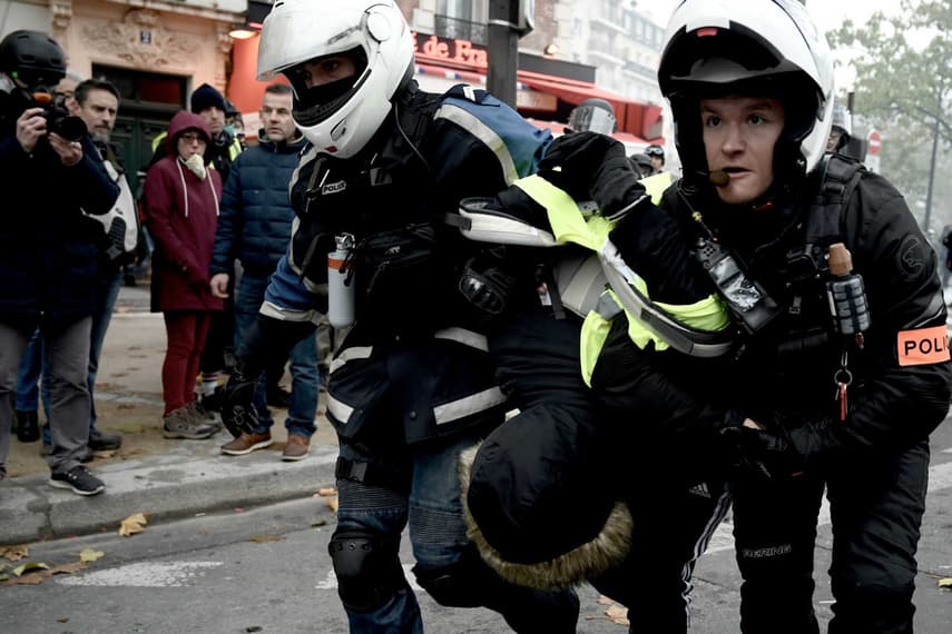 French police face probe after video emerges of Paris protest clashes
