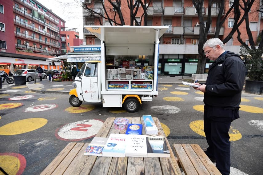 How a three-wheeled newsagent hopes to help keep Italians reading