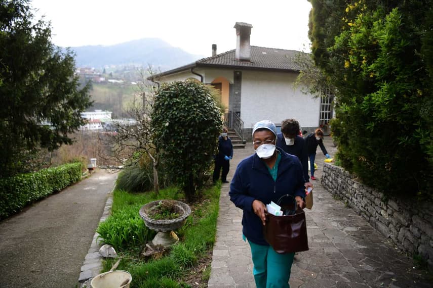 Italy and Spain suffer record deaths as coronavirus infection rate surges
