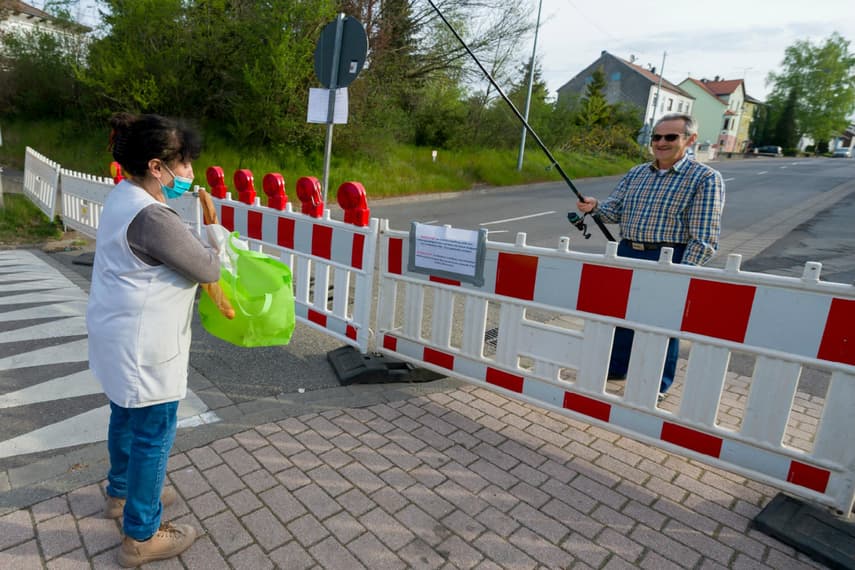 Baguette-loving Germans go fishing at French border for their pastry fix during pandemic