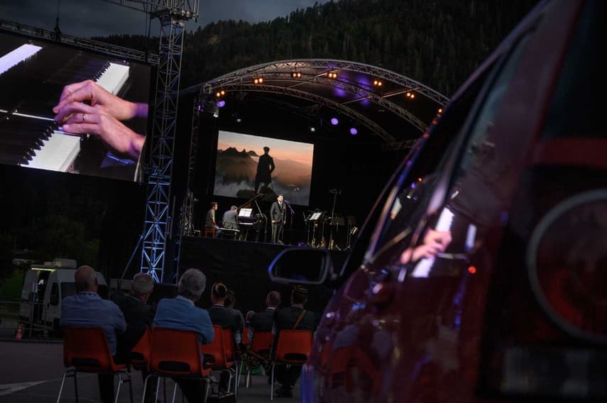 IN PICTURES: Swiss Alps alive with sound of music at drive-in festival -  The Local