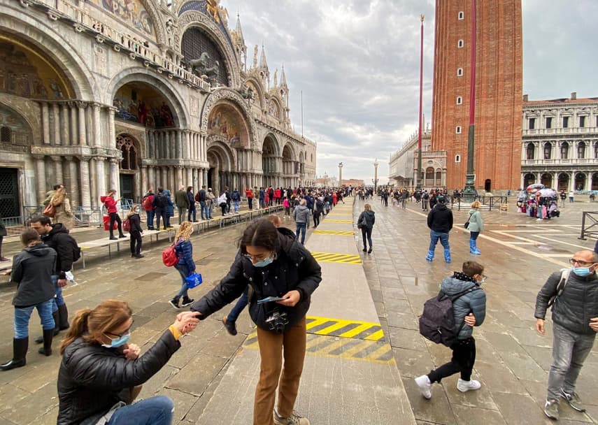‘Disbelief and elation’: Venice residents celebrate after Mose sea barrier prevents flooding