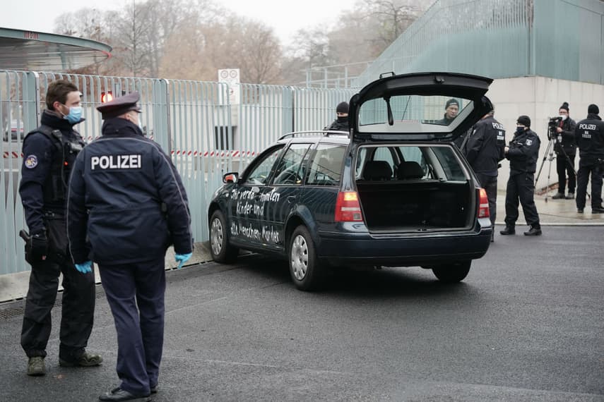 Man held after car driven into German chancellery gates