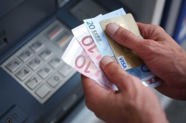 Why is Austria so set on making cash payments a constitutional right?