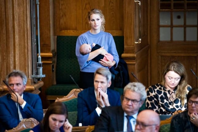 Danish parliament again throws out lawmaker for bringing baby