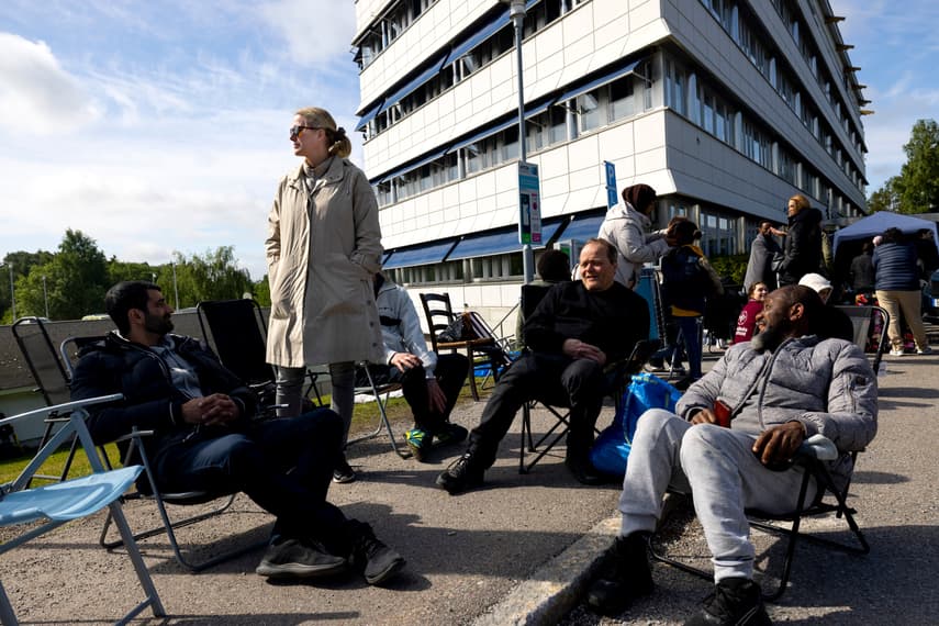 Travellers sleep rough outside Swedish airport in wait for new passports