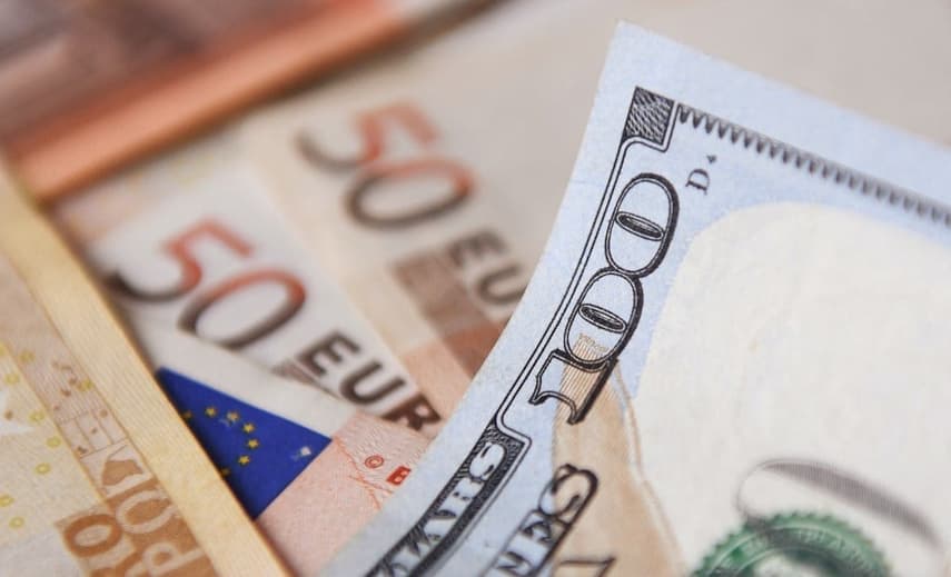 Euro falls to 20-year low against US dollar