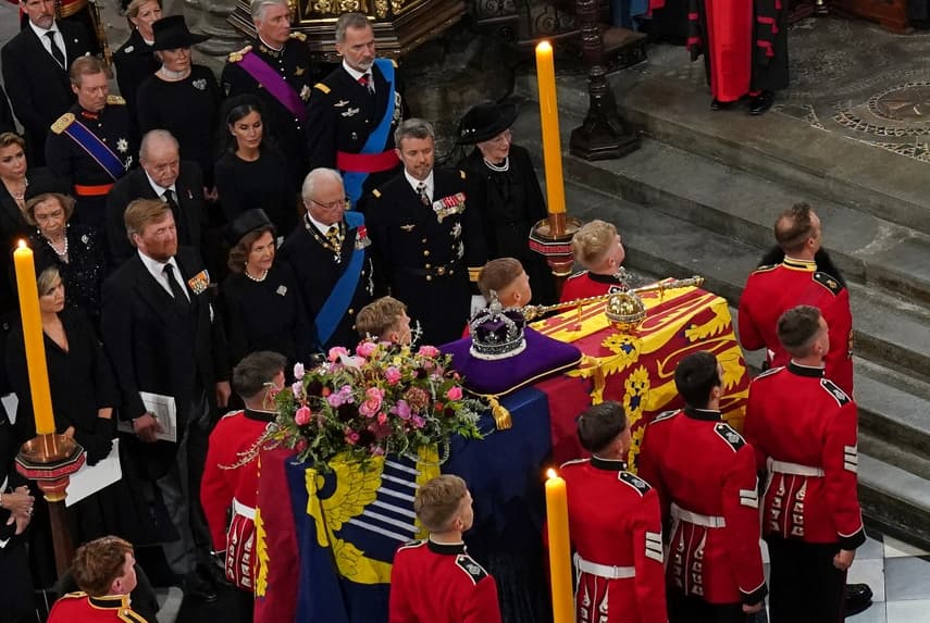 Spain's disgraced king and son side by side at Elizabeth II's funeral