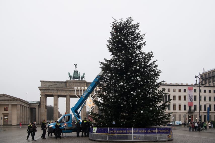 German climate activists cut off top of Berlin Christmas tree