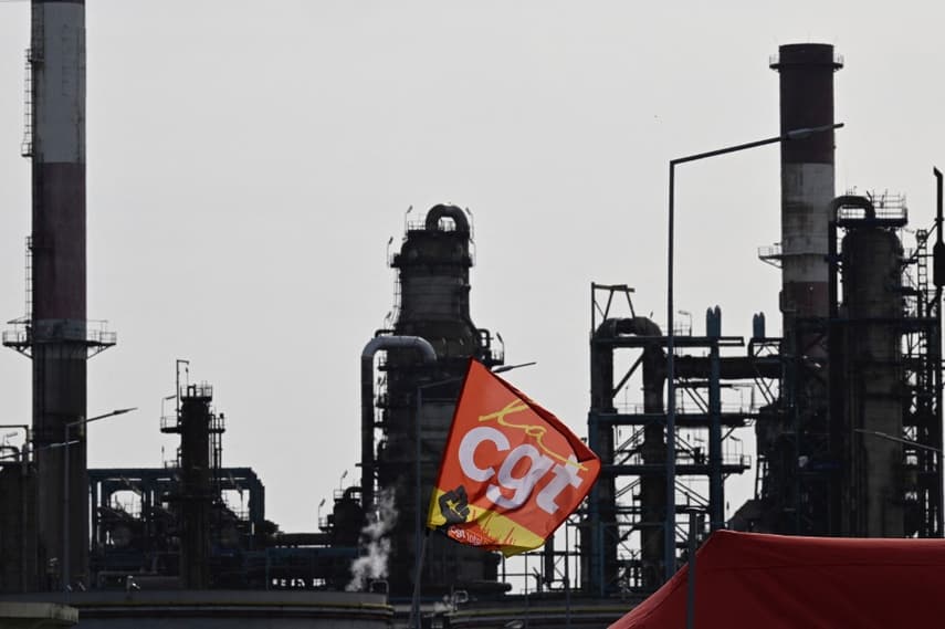 French refinery workers strike and threaten blockades as pension battle heats up