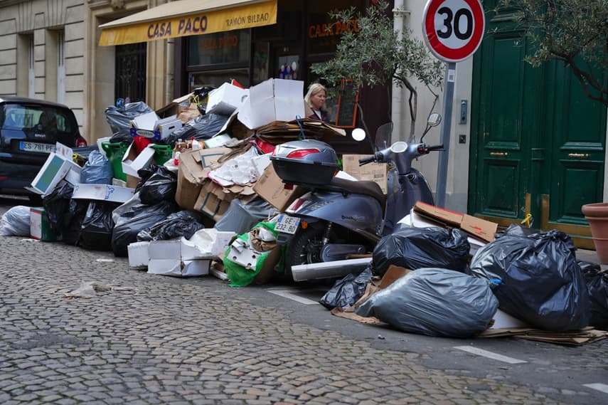 Minister demands Paris officials order striking refuse collectors back to work