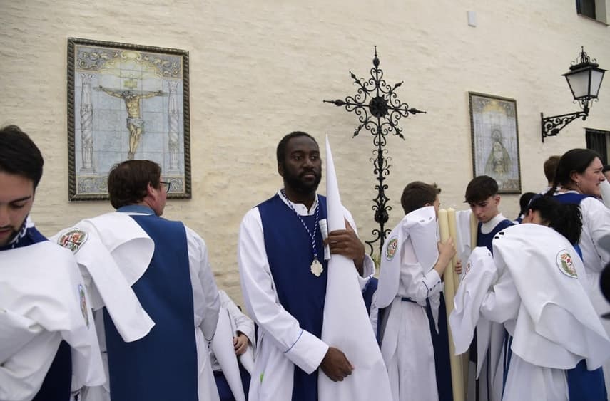 In Spain, brotherhood set up by slaves marches at Easter