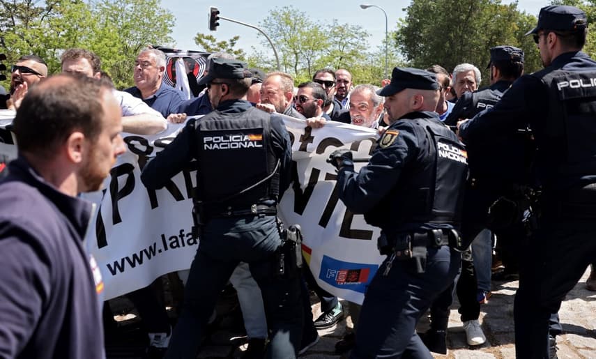 Far right and police clash as Spain's fascist leader re-buried