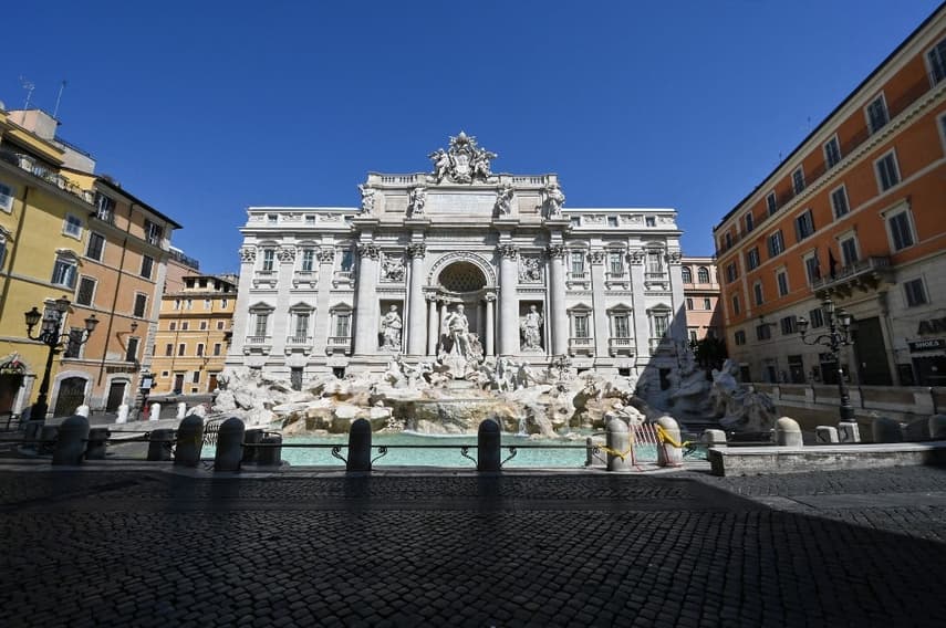 Climate activists turn Rome's Trevi Fountain water black