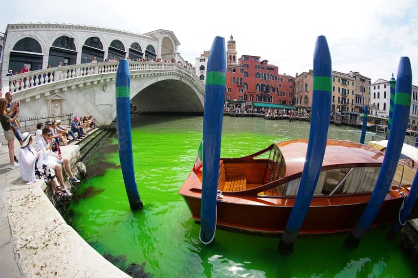Venice police investigate how Grand Canal turned bright green