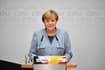 Merkel confirms ready to govern with liberals and Greens