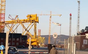 Three seriously injured after crane snaps