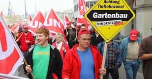 Unions seek higher pay in Labour Day marches