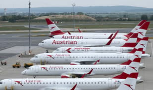 Austria sees scores of flight cancellations after airline staff contract Covid