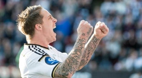 Rosenborg star charged over policeman assault